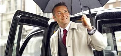 Photo of man with umbrella